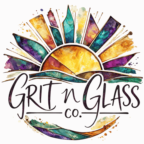 Grit n Glass Co logo featuring a stained-glass-style sunburst with teal, purple, gold, and yellow shards, above the text 'GRIT n GLASS co.' in dark script on a dark red background.